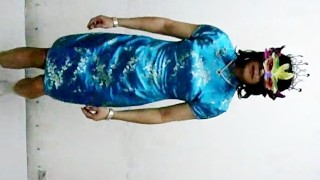 Hong Kong lesbian shemale Shirley wearing Chinese qipao & a mask