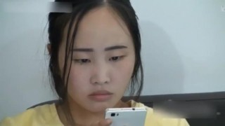 A chinese daugther is spanked by her mother for showing off on the phone