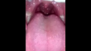Chinese girl open mouth swallow bread
