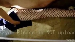 Chinese amateur with stocking giving footjob